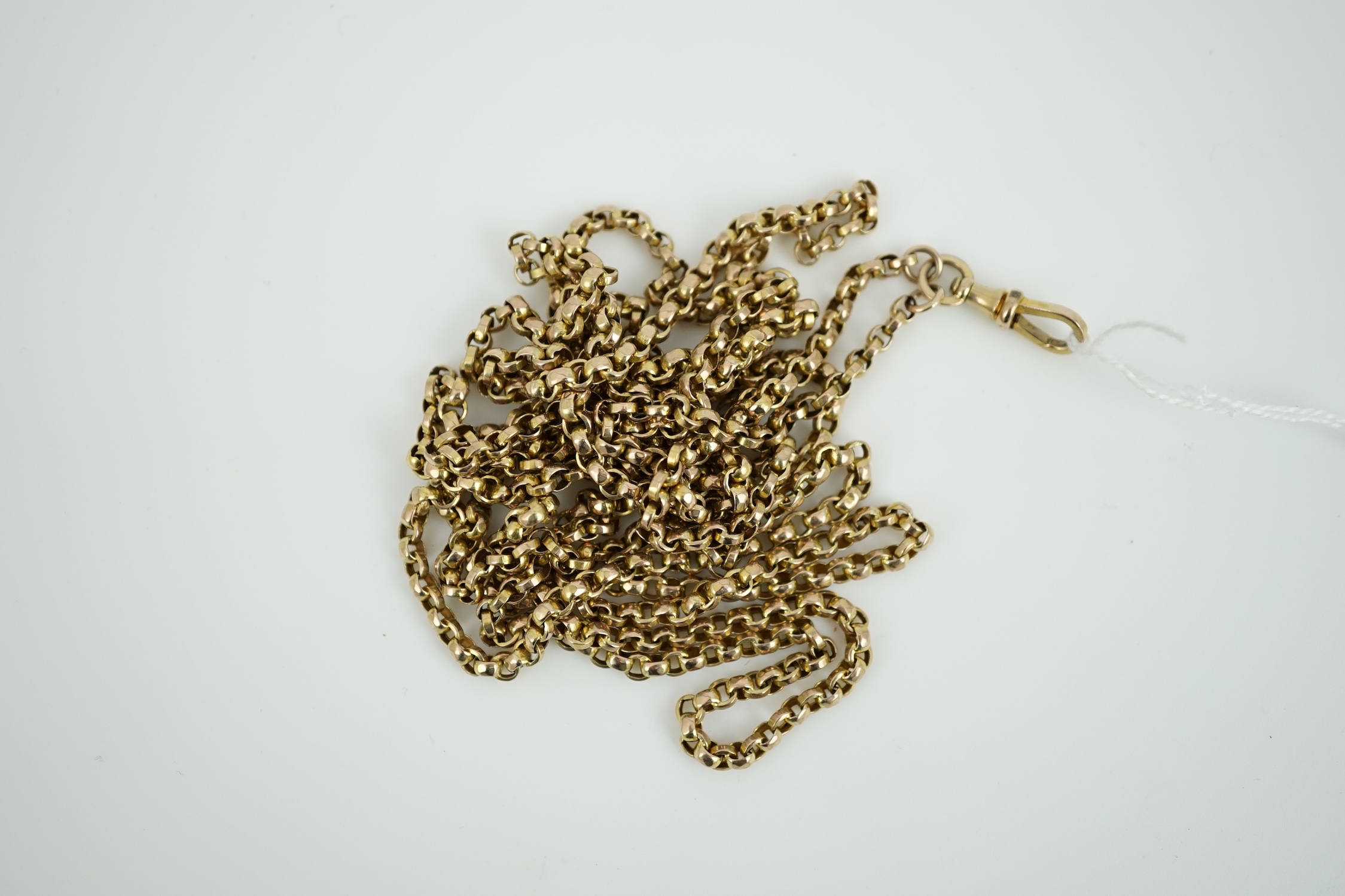 An early 20th century yellow metal guard chain, 169cm, 38 grams.